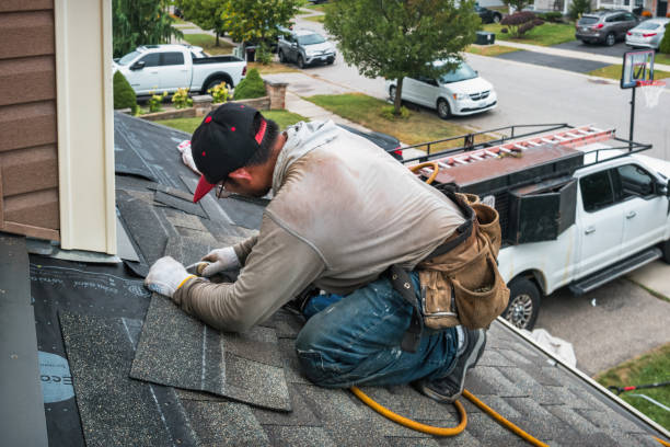 Professional Flat Roof Repair technician working in Douglas, MI